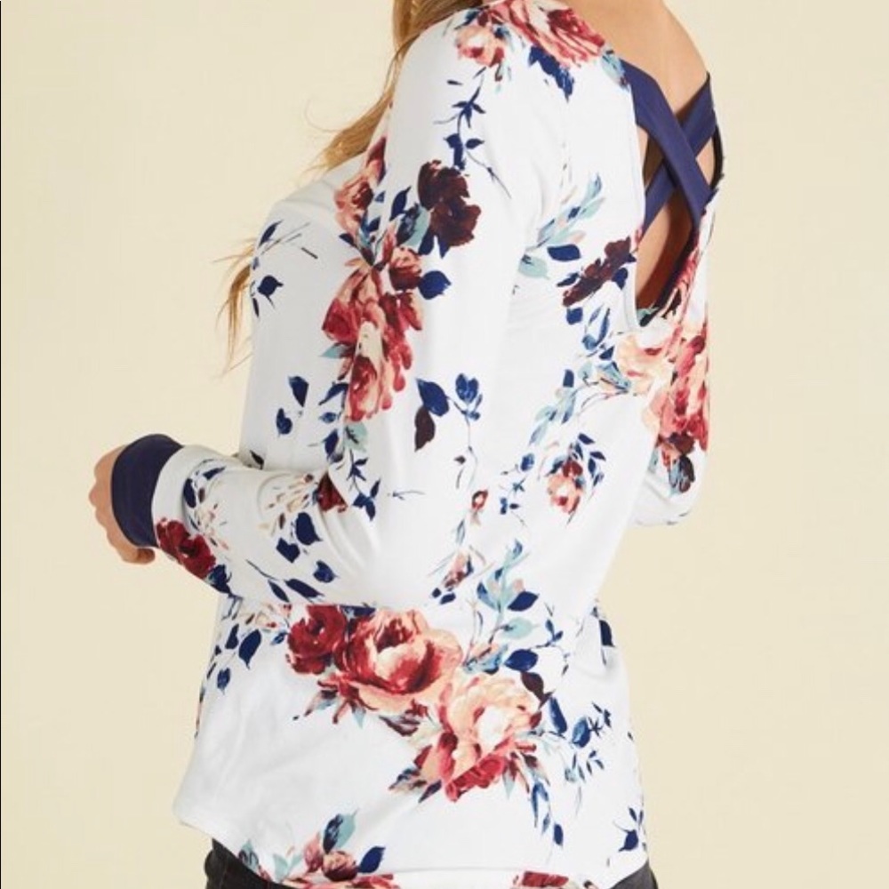 Buttery soft ivory floral with criss cross back